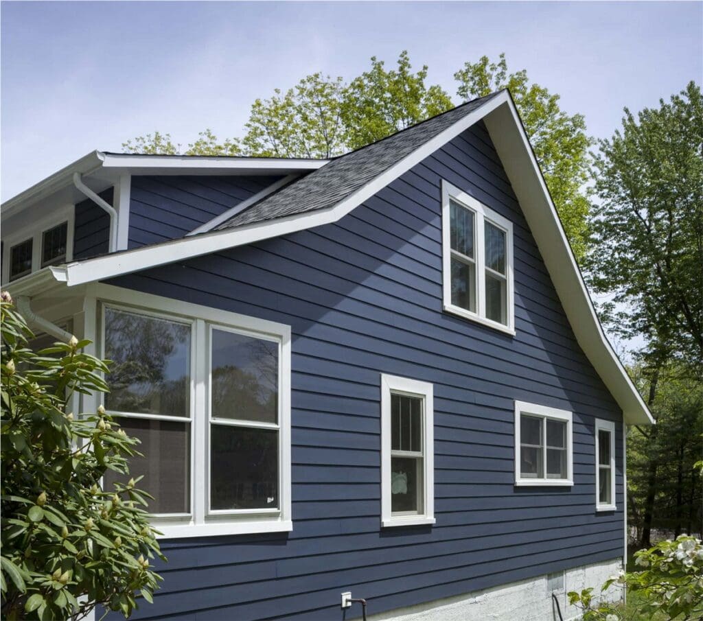 Service Areas. Charming home exterior featuring HXHome Solutions' elegant blue siding, creating a timeless and stylish facade.